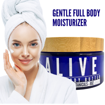 Woman applying Valentine's Alive triple whipped mango coconut body butter to face.